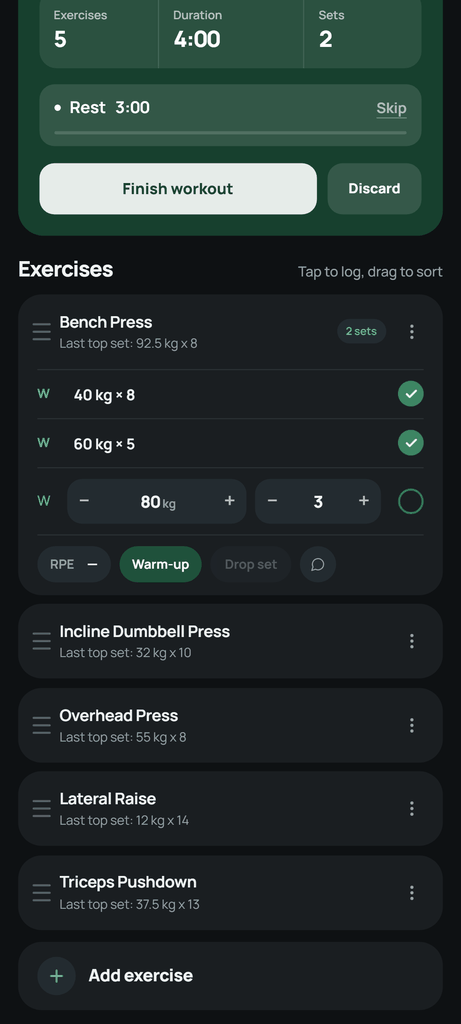 Warm-up sets marked separately from the working sets of the same exercise in Setlane.